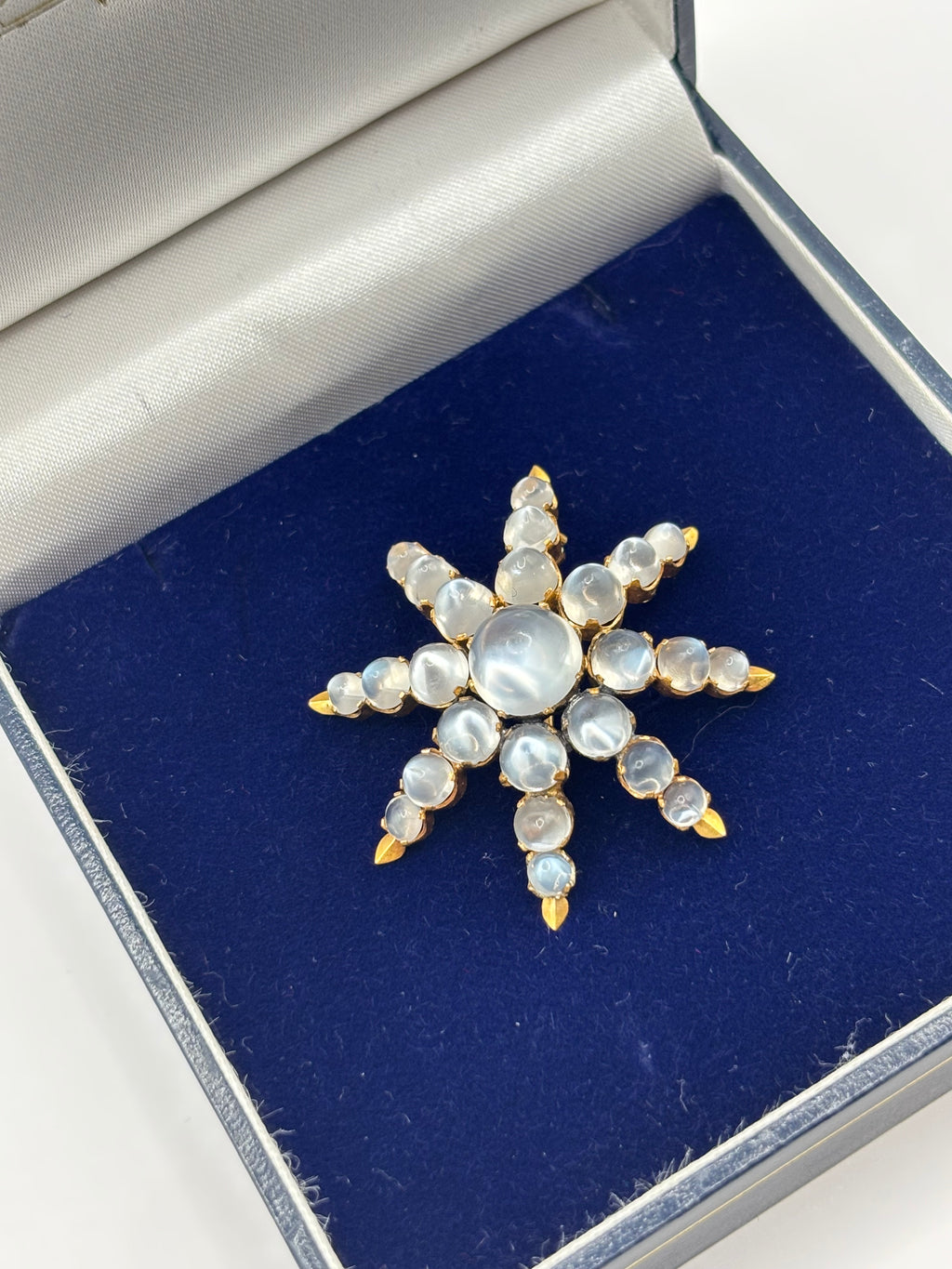 Antique Victorian 18K Gold Moonstone Eight-Ray Star Brooch, Circa 1890