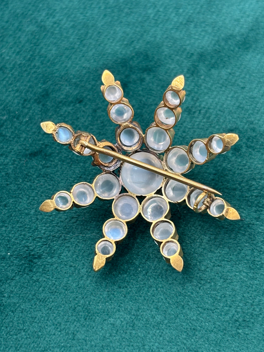 Antique Victorian 18K Gold Moonstone Eight-Ray Star Brooch, Circa 1890