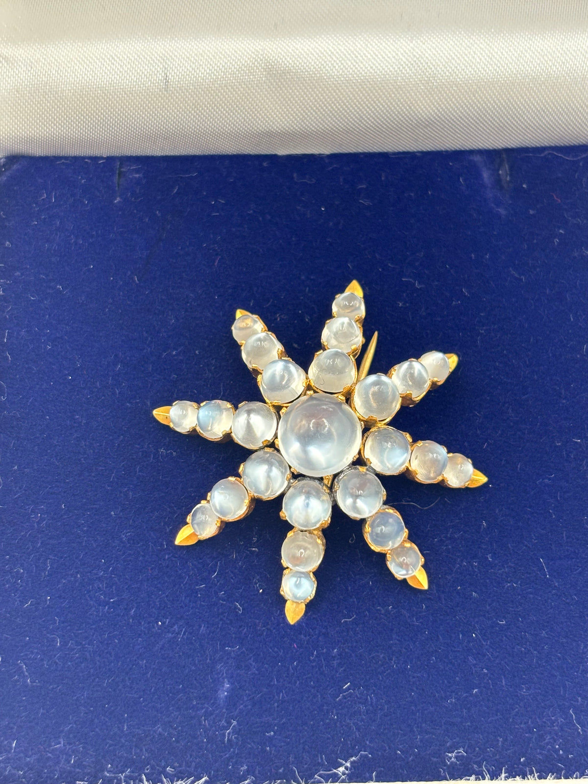 Antique Victorian 18K Gold Moonstone Eight-Ray Star Brooch, Circa 1890