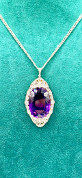 Edwardian Platinum-Topped Gold Convertible Brooch Pendant with Monumental Oval Amethyst and Old-Cut Diamonds, Circa 1900–1915